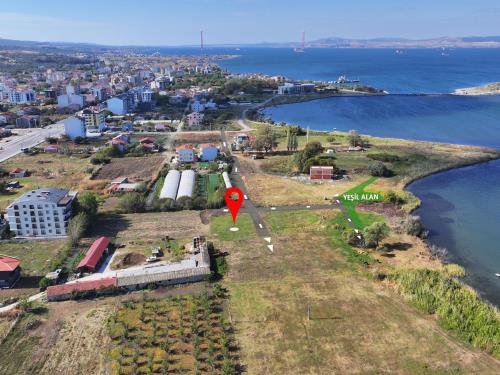 HEMEN İNŞAAT YAPABİLECEĞİNİZ DENİZE YÜRÜME MESAFESİNDE SATILIK YALI ARSASI